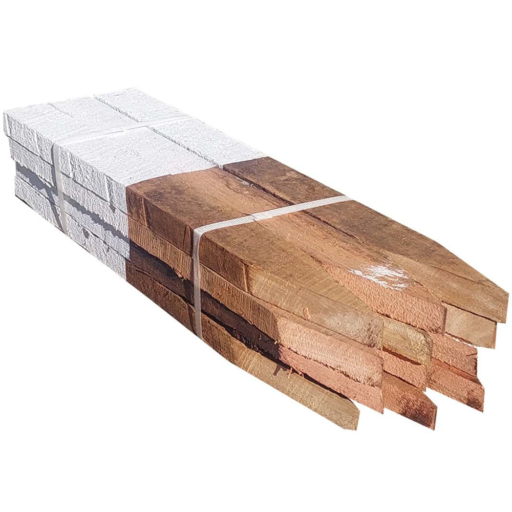 pack of 12 white painted wooden tree stakes.